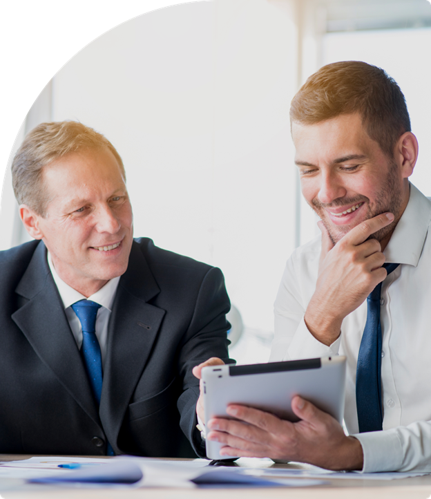 Two professionals discussing real estate investment financing options for rental and fix-and-flip properties.