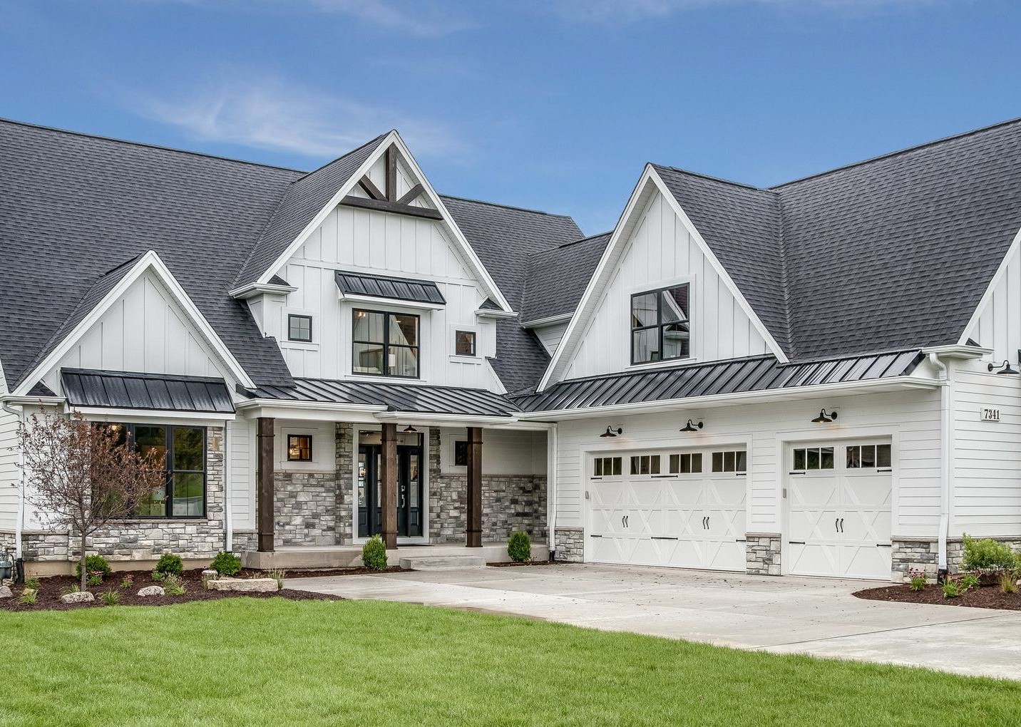 A stunning luxury home with a large driveway, representing high-value property financing through jumbo loans.