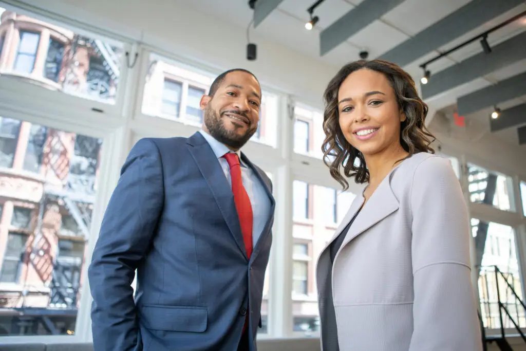 VP Capital Lending professionals standing in a modern office, ready to assist clients