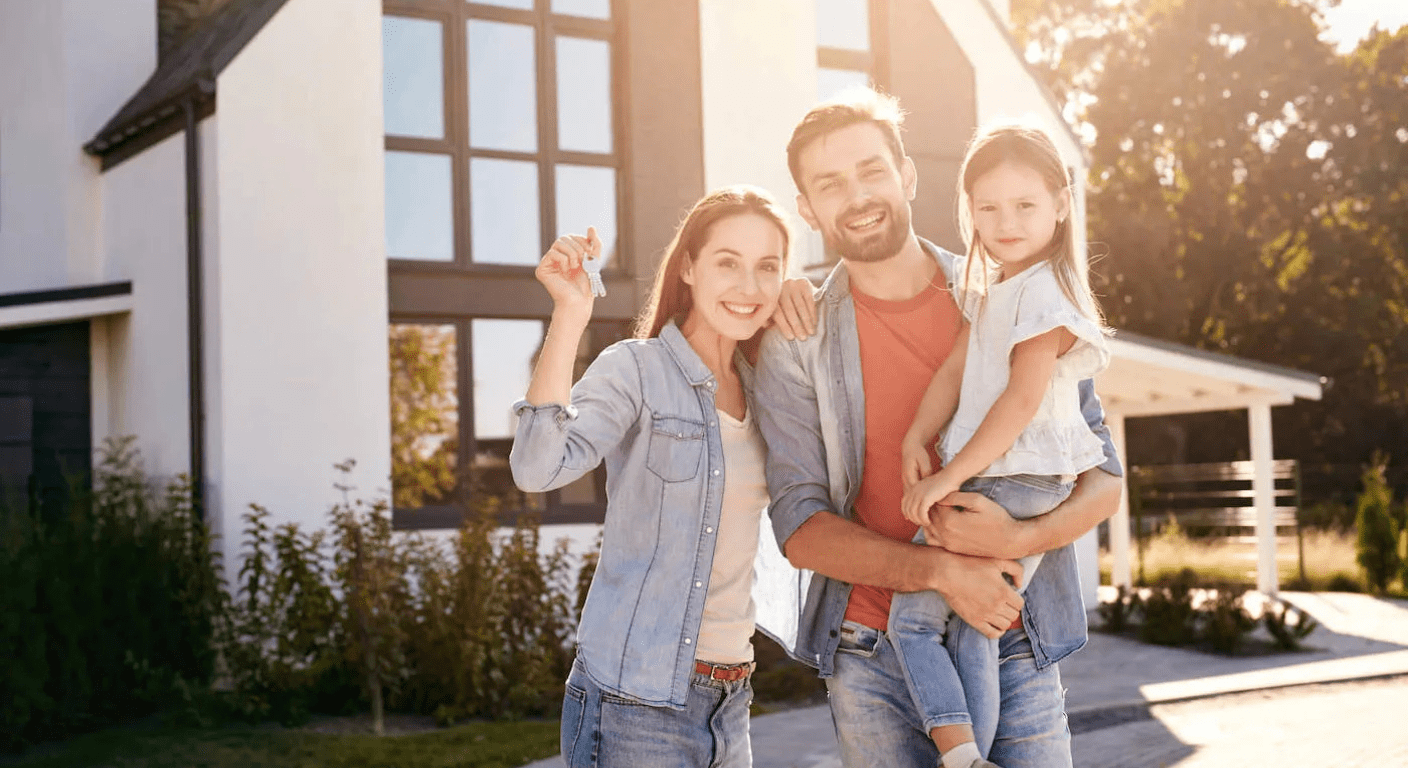 Family standing in front of their home after using home equity for renovations or financial goals
